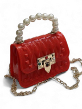 Jelly purse with pearl handle