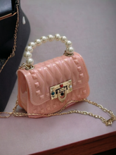 Jelly purse with pearl handle