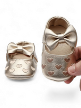 Gold heart baby shoes