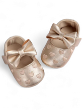 Gold heart baby shoes