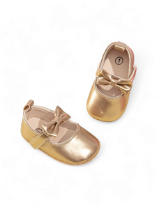 Gold bow baby shoes