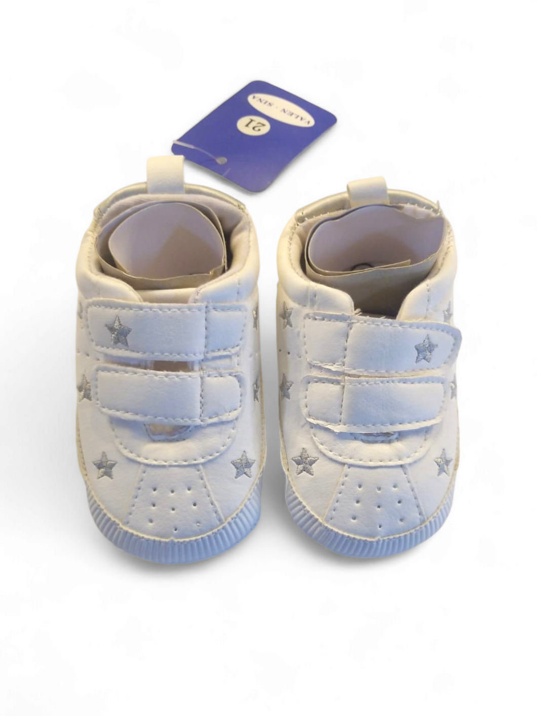 White baby shoes with star