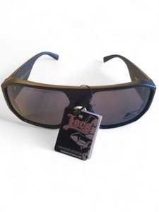 Teen boy locs sunglasses