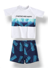 Positive and happy boy swimsuit