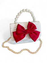 Pearl handle girl purse with red bow